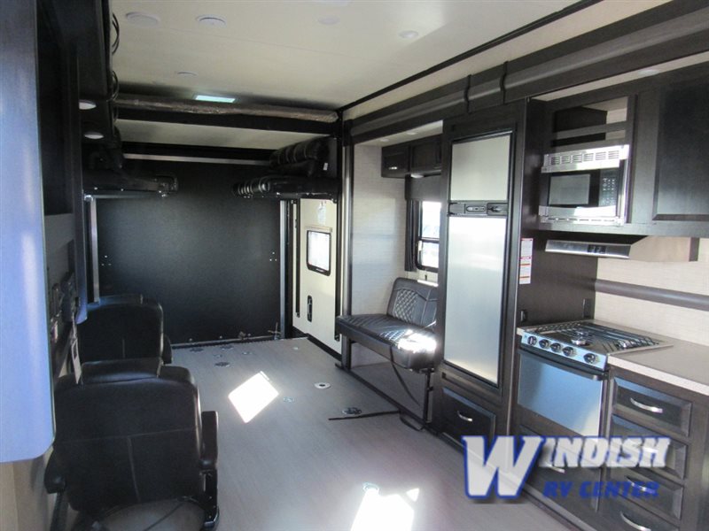 Dutchmen Triton Fifth Wheel Toy Hauler Garage with living area